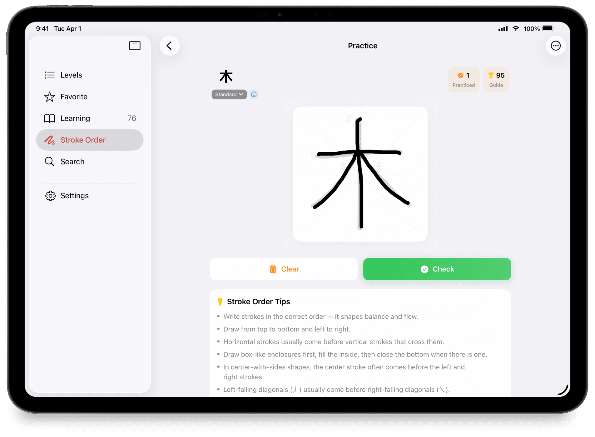 KanjiMate stroke practice on iPad with stroke order tips